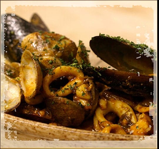 Mussels, clams and calamari in sauce, one of Soriah's plates