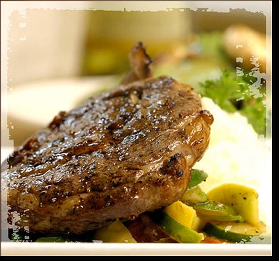 Grilled pork chop with sautéed squash and mashed potatoes