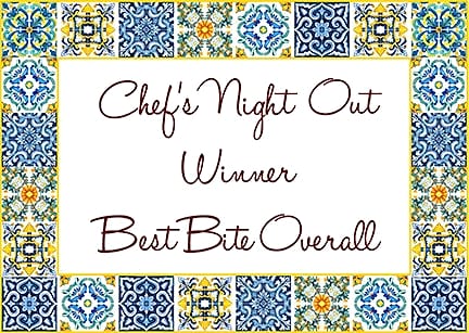 Card framed in painted tiles reading: Chef's Night Out Winner, Best Bite Overall